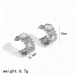 Detailed view of silver C-shaped cubic zirconia earrings with 20mm height and 10.5mm width