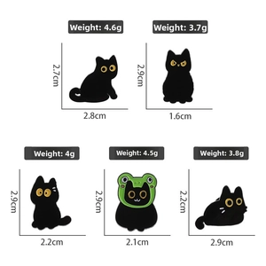 Size chart for black cat enamel pins showing weights and dimensions in various poses