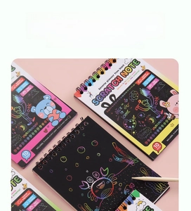 Kids scratch art note set with cartoon covers, wooden stylus, and colorful inner pages