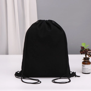 Minimalist black cotton drawstring bag for jewelry storage and dustproof packaging