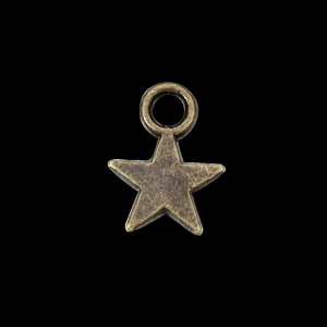 Macro shot of vintage bronze star alloy charms with top loop for DIY jewelry making