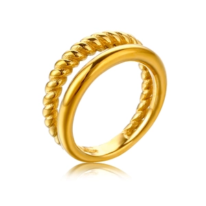 Detail of double-layer gold ring with polished smooth band and twisted rope design