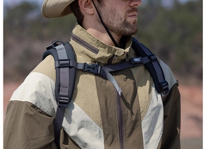 Detail of adjustable chest buckle and nylon webbing on professional outdoor backpack straps