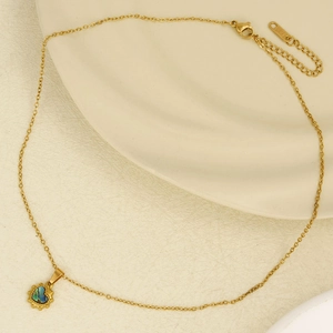 Golden heart-shaped pendant necklace with iridescent abalone shell inlay on O-chain
