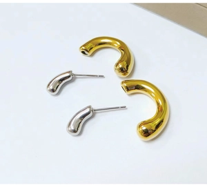 Chunky teardrop metal earrings set, minimalist gold and silver hoop drop design for women.
