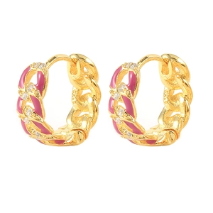 Macro detail of gold chain-link earrings with pink enamel and white zircon accents