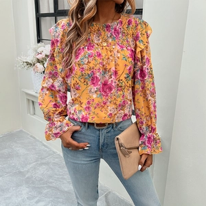 Women's yellow floral long sleeve shirt with ruffle collar and pleated detail