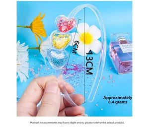 Detailed view of sweet candy-colored headband with transparent glitter heart sequins