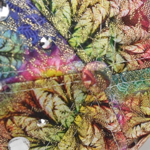Macro detail of tropical print baseball cap with gold glitter and clear rhinestone stud