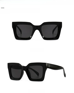 Front and 45-degree views of black thick square sunglasses with triple metal rivets