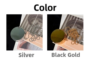 Mini acrylic round chain bag in polished silver and black-gold finishes