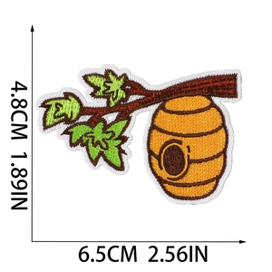 Embroidered honeycomb patch with sunflower and bee design, size 6.5cm x 4.8cm on white background