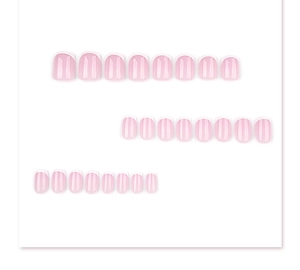 Close-up of minimalist French short square press-on nails with white tips and pink base