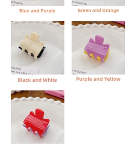 Detailed close-up of glossy candy-colored mini hair claws in various vibrant color combinations