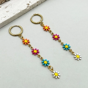 Colorful daisy tassel earrings in stainless steel with orange and blue floral drops