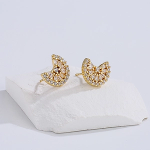 Golden irregular geometric stud earrings with 18K gold plating and baguette zircons