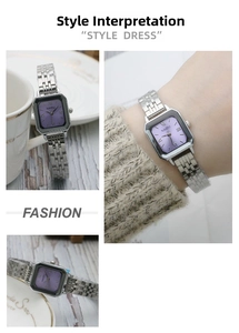 Detail of square purple dial watch with silver stainless steel band and Roman numerals