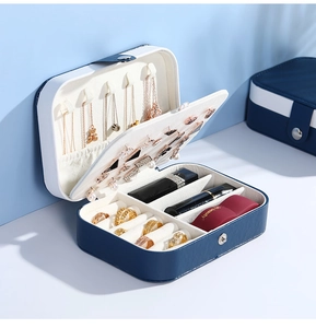 Detailed interior of portable PU leather jewelry box with necklace hooks and ring slots