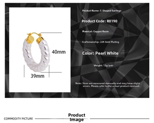 Detailed view of 22K gold-plated C-shaped earrings with pearl white twisted rope design