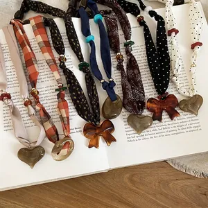 Retro Fabric Ribbon Necklace With Acrylic Bow Heart Pendant Vintage Maillard Style Long Chain For Women