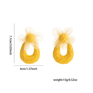Detail view of yellow woven raffia earrings with mesh flowers and exact dimensions