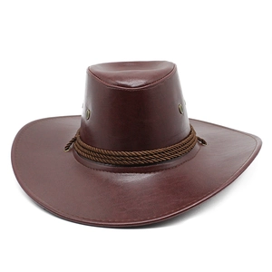 Detailed view of brown faux leather cowboy hat with braided rope band and metal eyelets