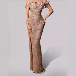 Elegant champagne off-shoulder evening gown with leaf appliqué and sequin slit skirt