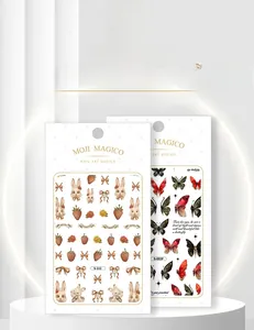 Detailed view of self-adhesive mini nail stickers featuring rabbit and butterfly designs