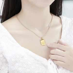 Minimalist 18K gold plated padlock pendant necklace worn on neck with round bead chain