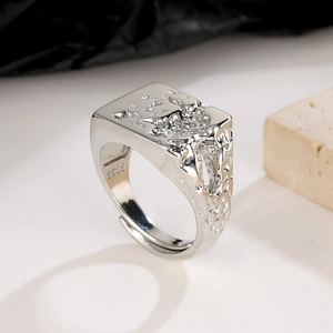 Macro shot of silver lava textured ring showing S925 engraving and adjustable open band