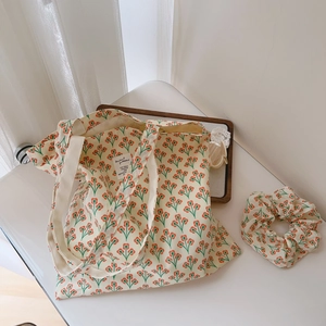 Floral cotton tote bag with matching scrunchie featuring vintage orange tulips on white