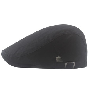 Classic black cotton newsboy beret hat with adjustable metal buckle on white background
