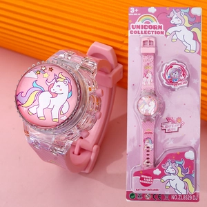 Unicorn children's luminous watch with rotating fidget top feature in retail packaging