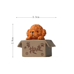 Miniature brown teddy dog figurine in a box with dimensions 3.3cm width and 2.8cm height