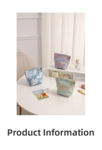 Detailed close-up of floral jacquard makeup bags with gold zippers and brand label
