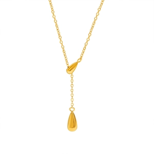 Detailed view of a gold-plated teardrop pendant on an elegant Y-shaped chain necklace