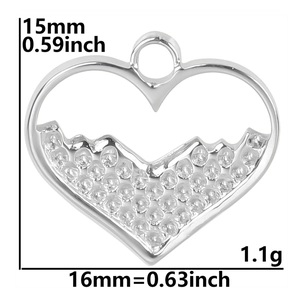 Detailed view of silver heart pendant with dimensions 15mm by 16mm and textured finish