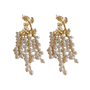 Golden maple leaf earrings with white pearl tassels and vintage French aesthetic