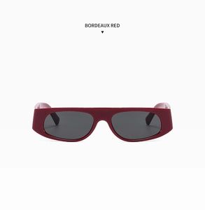 Detail of Bordeaux Red rectangular sunglasses with sleek narrow frames and dark lenses