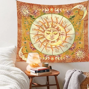Detail of bohemian sun and moon tapestry with zodiac signs in a cozy bedroom setting