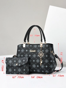 Detail showing dimension specs of a gray monogram tote and envelope wallet set