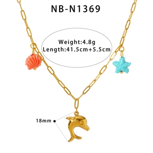 Gold necklace detail with seashell, starfish and dolphin pendants and product measurements
