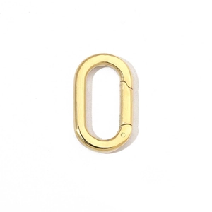 Detailed view of polished gold oval spring clasp connector for DIY jewelry making