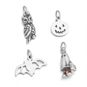 Detailed set of silver stainless steel Halloween pendants including owl, pumpkin, and bat