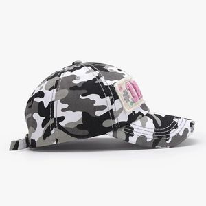 Unisex camouflage baseball cap with pink number 11 embroidery and distressed brim details