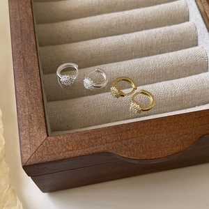 Elegant gold and silver S925 sterling silver hoop earrings with zircon on a velvet box