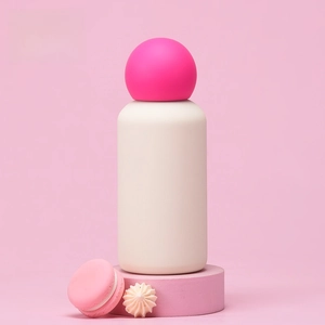 350ml ivory white and rose red vacuum insulated bottle on a pink display platform