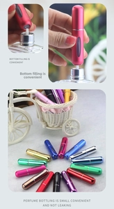 Detail of 5ml bottom-fill perfume atomizers showing refilling process and various colors