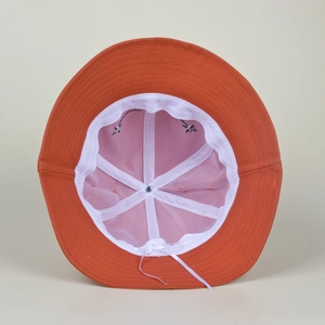 Orange frog bucket hat interior view with pink mesh lining and adjustable strap