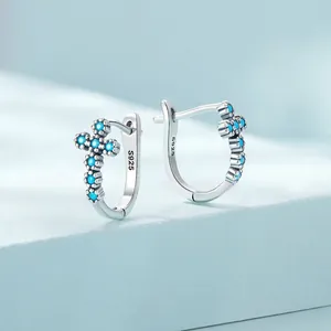 925 sterling silver hoop earrings with turquoise cross charms in minimalist style